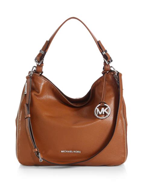 michael kors hobo bag saddle brown and gold studs|Michael Kors hobo bag.